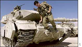 Israeli soldier on a tank